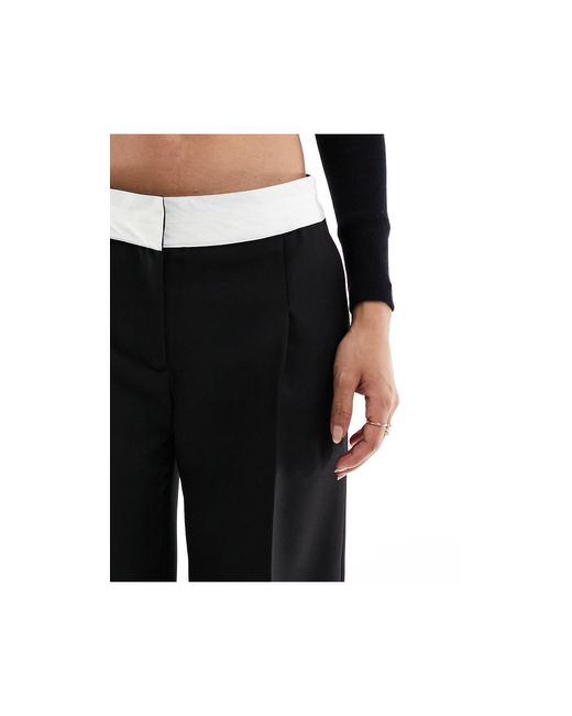 Pantaloni neri con fascia di Miss Selfridge in White