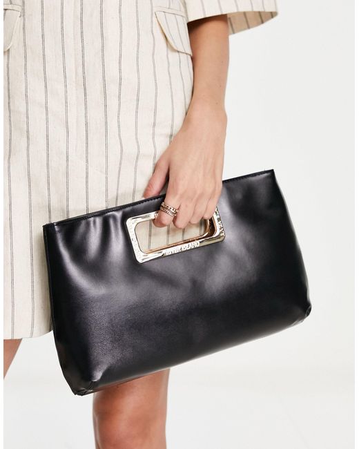 Bolso clutch con asa River Island de color Black