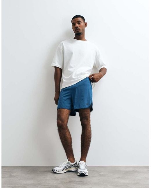 New Balance White Rc Essential Short 5" for men