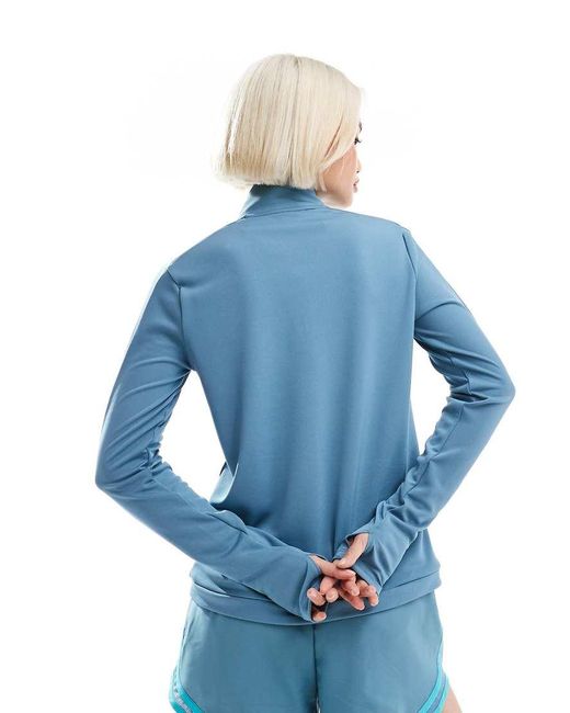 Top Azul De Manga Larga Con Media Cremallera Dri-Fit Pacer De Nike de color Blue