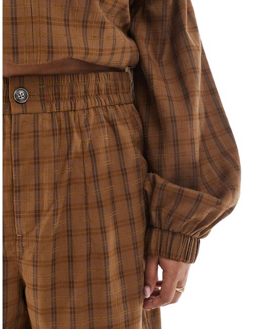 Curve - pantalon texturé coupe bouffante d'ensemble à enfiler avec surpiqûres - moutarde à carreaux ASOS en coloris Brown