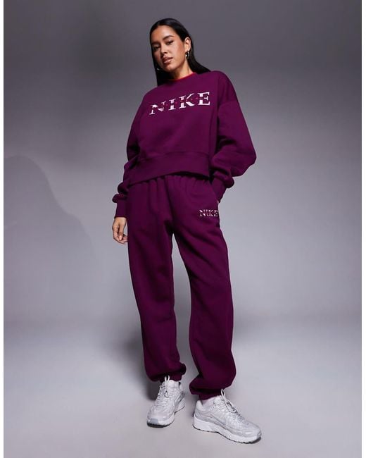 womens purple nike sweatsuit