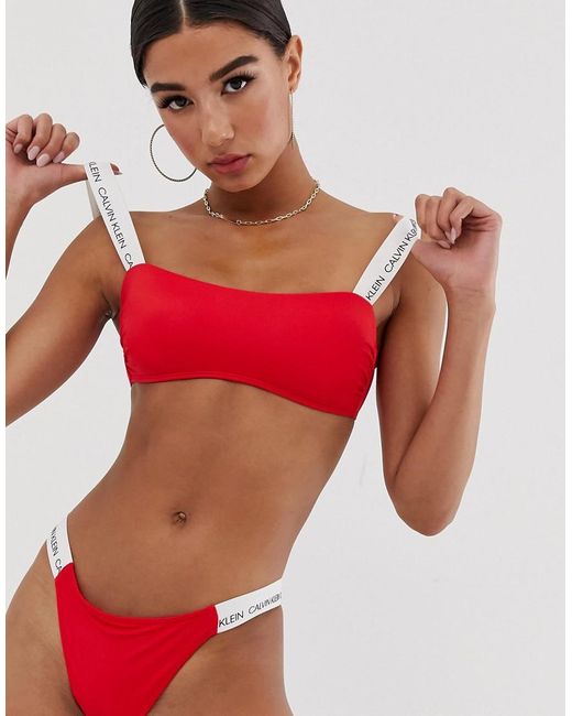 Top bikini rosso a fascia con logo e spallina di Calvin Klein in Rosso |  Lyst