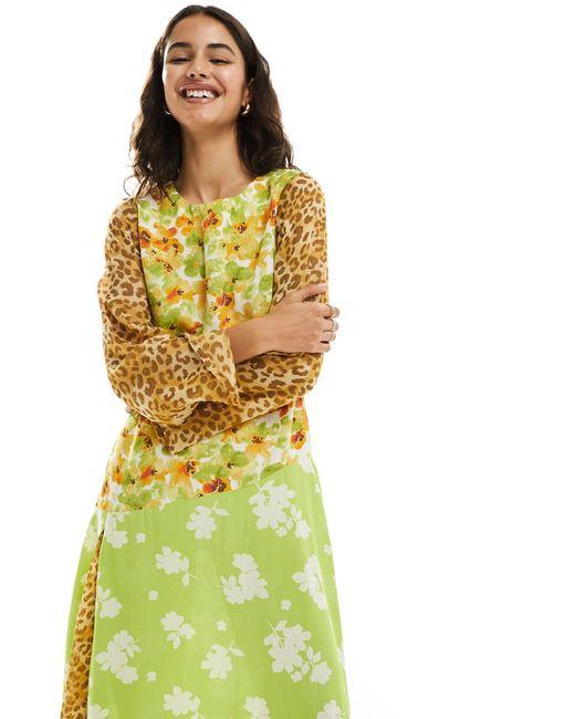 Robe mi-longue à manches longues avec imprimés fleuri et léopard contrastants Never Fully Dressed en coloris Yellow