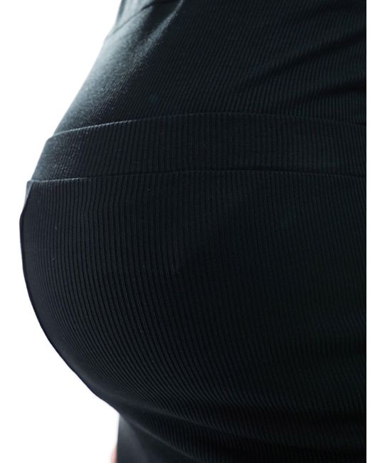 Mamalicious maternity - pantalon d'ensemble évasé en jersey recouvrant le ventre Mama.licious en coloris Black