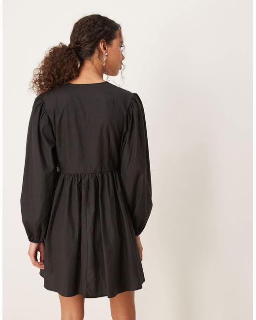 Robe courte nouée - charbon Ghospell en coloris Black