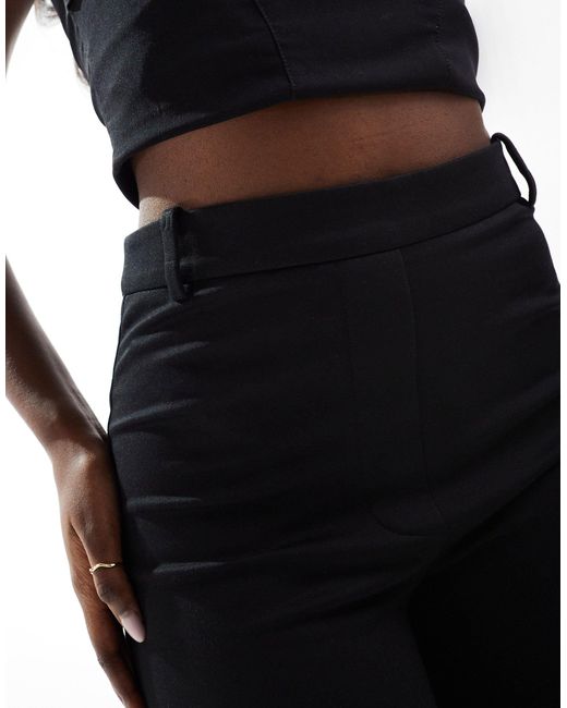 Pantalon ajusté en maille point ASOS en coloris Black
