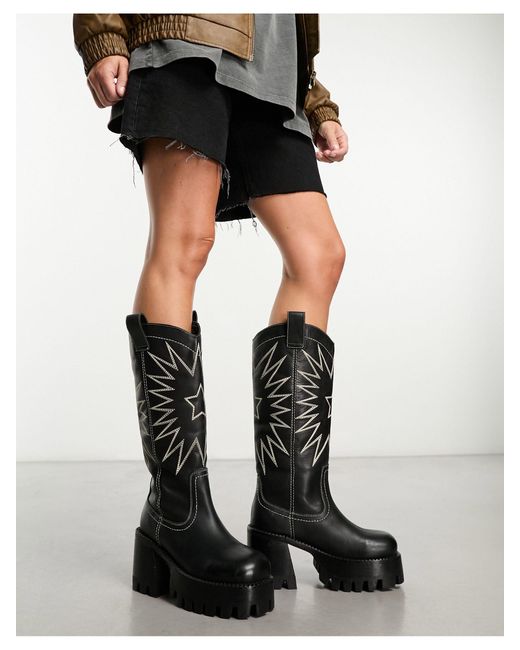 Cosmic - bottes hauteur genou en cuir style western à semelle crantée ASOS en coloris Black