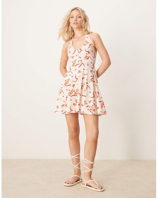 Robe courte dos nu avec ourlet à godets et imprimé piments ASOS en coloris Red
