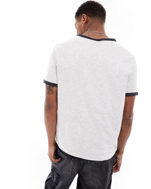 Camiseta con estampado gráfico y ribetes buck Weekday de hombre de color White
