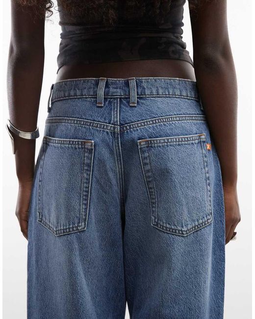 Collusion Blue X001 Antifit Mid Rise Jean With 90s Distressing