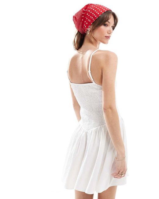 The Frolic White Exclusive Cami Square Neck Shirred Dropped Waist Mini Dress