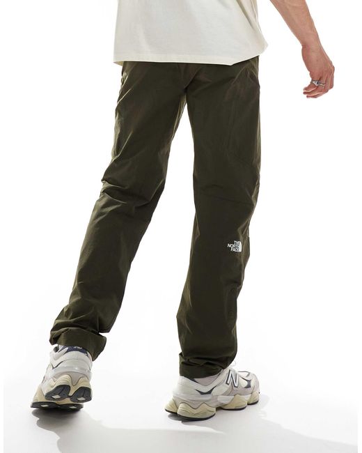 Exploration - pantalon fuselé à poches cargo The North Face pour homme en coloris Green