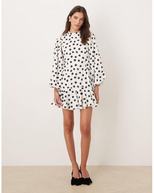 Sister Jane White Illume Exclusive High Neck Balloon Sleeve Ruffle Drop Hem Mini Dress