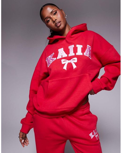 Kaiia Oversized Hoodie Met Geborduurd Striklogo in het Red