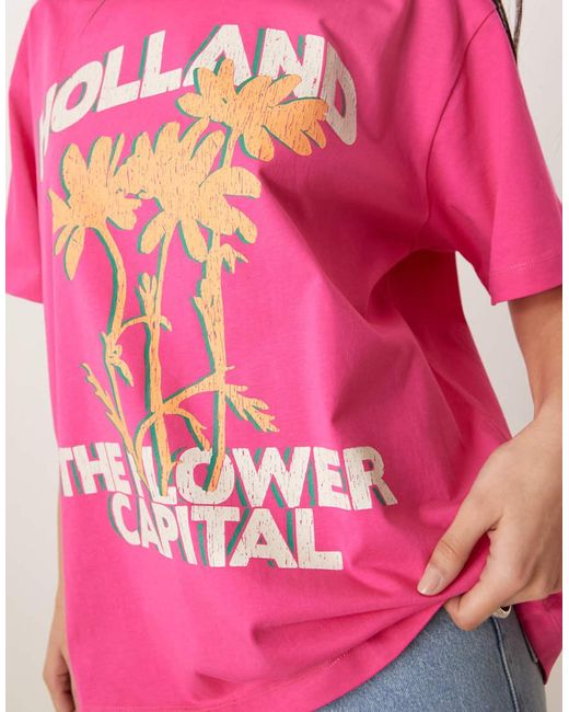 Camiseta Rosa Extragrande Con Estampado Gráfico De Flores Y Texto "Holland" De ASOS de color Pink