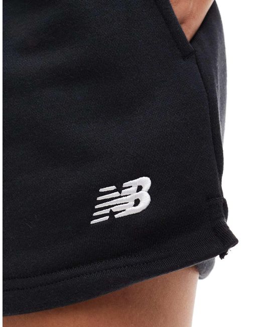 Sport essentials - short en tissu éponge New Balance en coloris Black