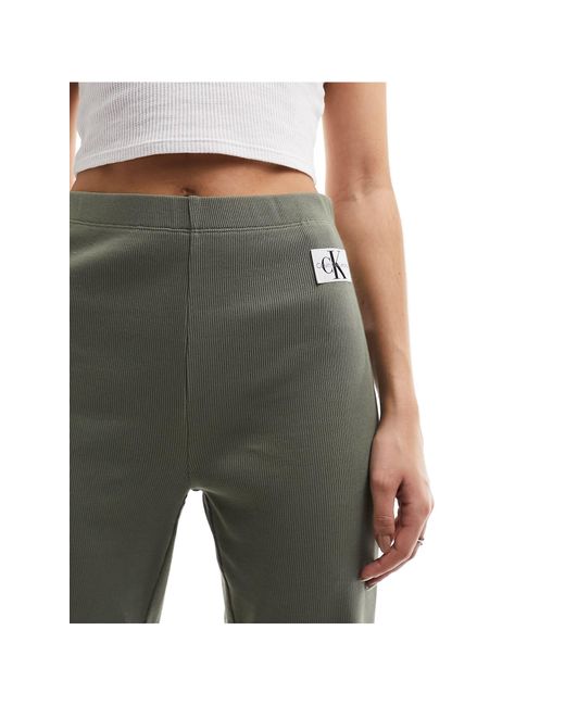 Pantaloni dritti oliva con logo di Calvin Klein in Green