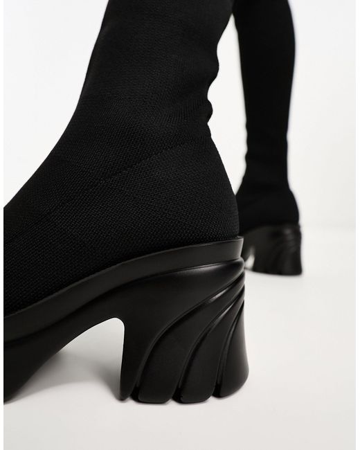 Stivali cuissard neri con plateau di Pimkie in Black