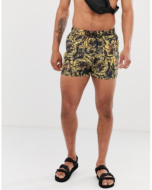 tan swim trunks