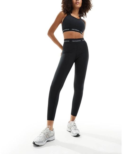 New Balance Black Linear Logo Sleek 25 Inch High Rise leggings