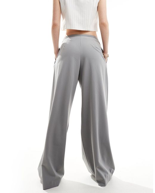 Pantaloni sartoriali a fondo ampio con fascia di Bershka in Gray