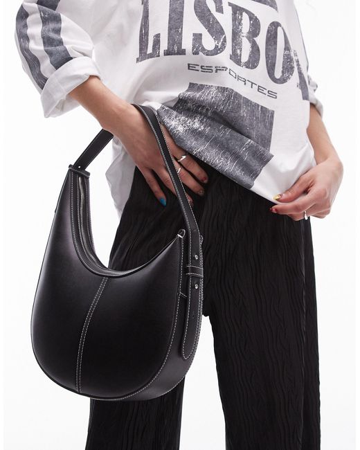Samina - sac porté épaule asymétrique et incurvé TOPSHOP en coloris Black