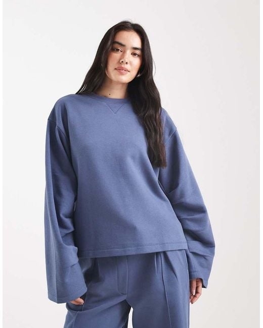 Sudadera Azul Denim Extragrande Con Detalle Fruncido En Las Mangas E Interior Afelpado De ASOS de color Blue