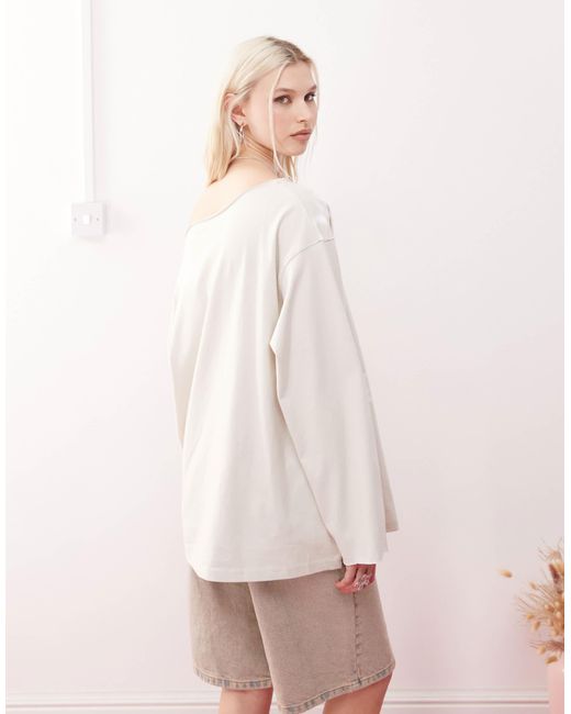 Weekday Pink Slash Neck Long Sleeve Top With Text Graphic Prints