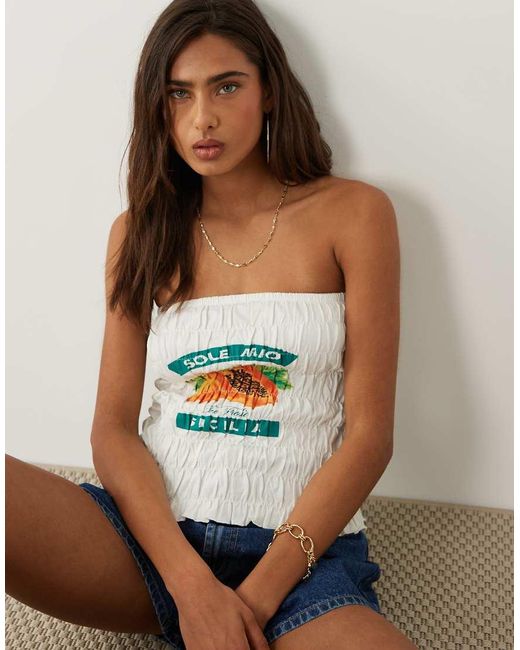 The Frolic Blue Exclusive Bandeau Shirred Papaya Graphic Top