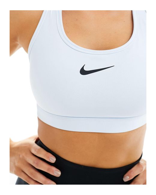 Swoosh dri-fit - reggiseno sportivo a supporto medio tinto di Nike in White