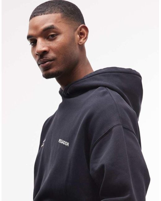 PEGADOR Black Rochefort Oversized Hoodie With Back Print Graphic for men