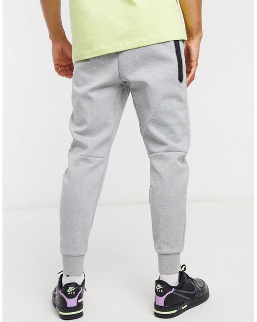 Joggers tecniciNike in Pile da Uomo colore Grigio | Lyst