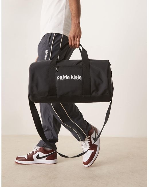 Calvin Klein White Retro Logo Holdall for men
