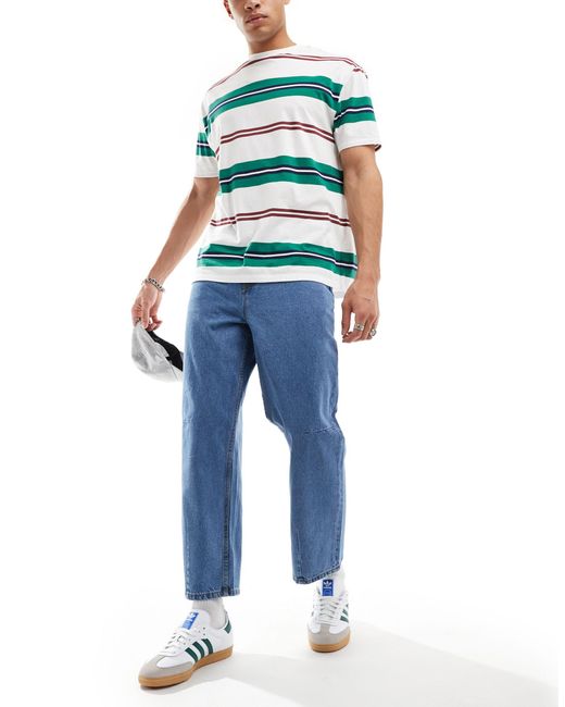 Jeans rigidi classici con pinces lavaggio medio di ASOS in Blue da Uomo