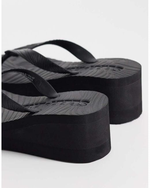 Sleeper Black High Platform Flip Flops