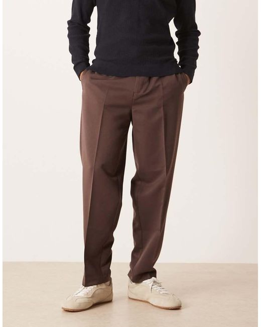 Pantalones De Vestir Marrones De Corte Tapered Extragrande Con Cinturilla Elástica De ASOS de hombre de color Brown