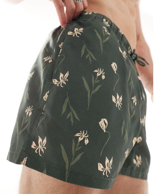 Pantaloncini da bagno taglio corto con stampa a fiori su sfondo scuro di ASOS in Green da Uomo