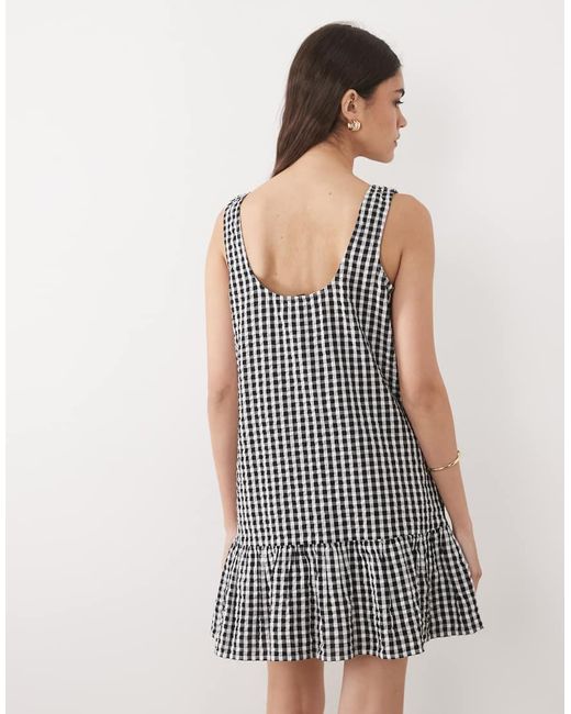 Nobody's Child Black Millie Sleeveless Dropped Waist Ruffle Hem Cotton Mini Dress