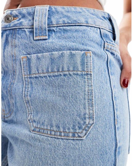 Jeans A Fondo Ampio Medio Con Tasche Applicate di New Look in Blue