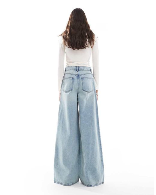 Vaqueros De Talle Alto Y Pernera Ancha Con Lavado Vintage De Asos Design Tall-Azul ASOS de color Blue