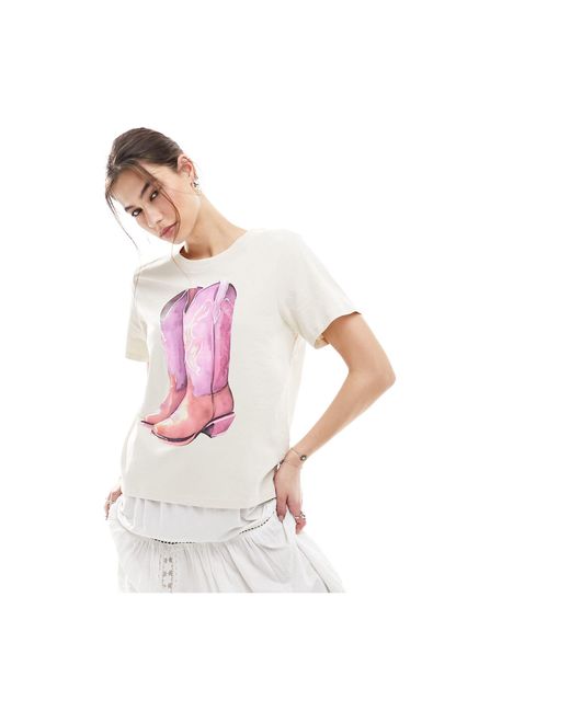 T-shirt à manches courtes avec imprimé santiags à l'avant - beige clair Monki en coloris Pink