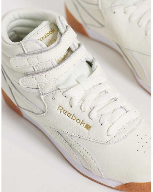 Reebok White Freestyle Hi Trainers