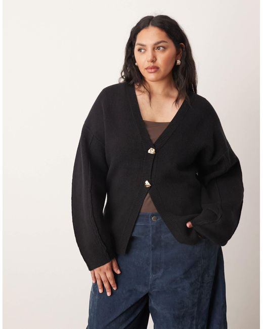 ARRANGE Black Curve Sculpted Waist Cardigan With Ovoid Sleeve