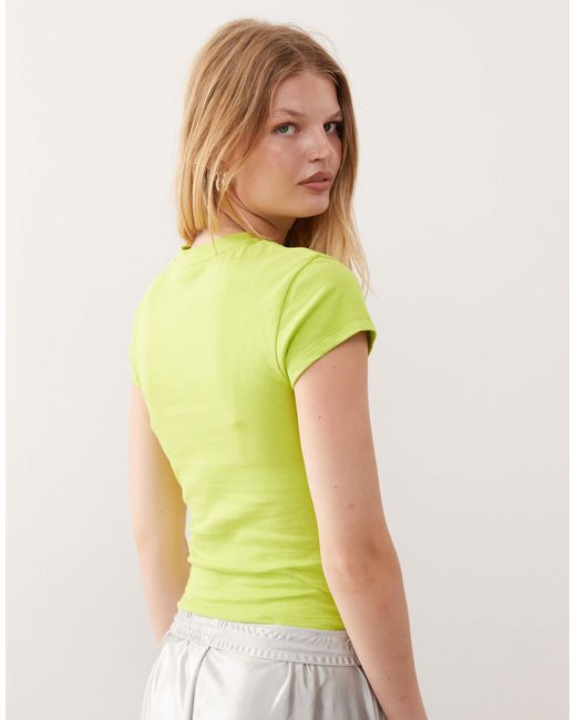 T-shirt effet rétréci à slogan brat charli xcx - officiel Collusion en coloris Green