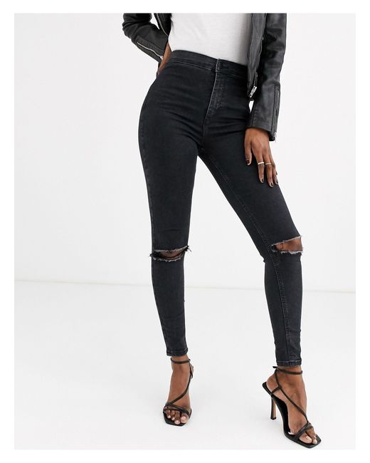 TOPSHOP Denim Joni Skinny Jeans With Rips in Washed Black (Black) - Lyst
