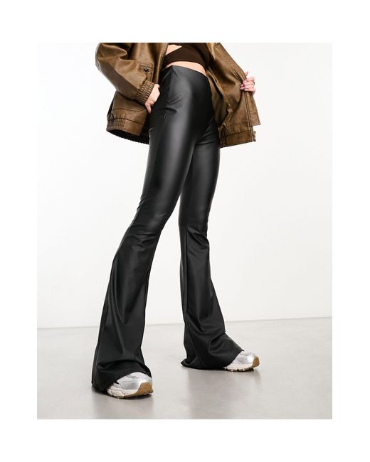 Bershka faux leather flared pants in black, ASOS