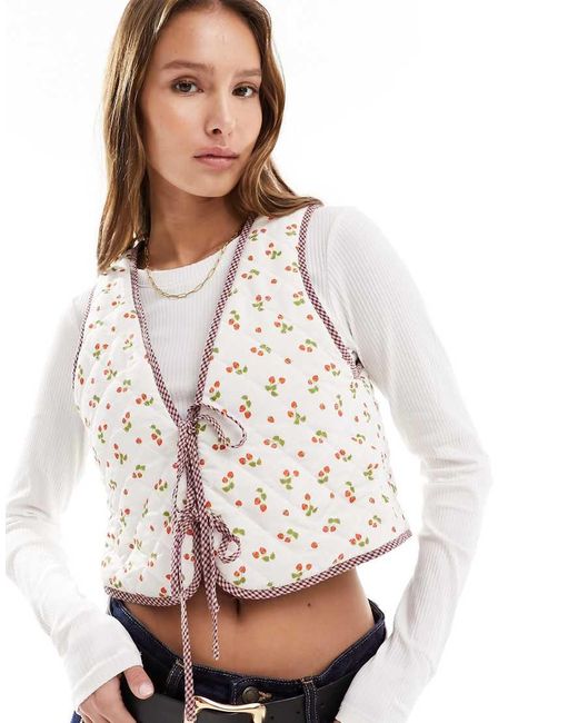 The Frolic White Exclusive Strawberry Print Reversible Quilted Vest