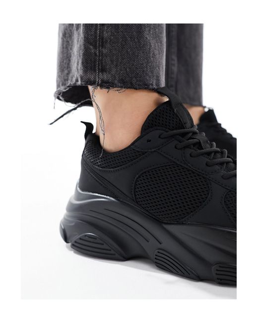 Drop - sneakers nera a pianta larga di ASOS in Black