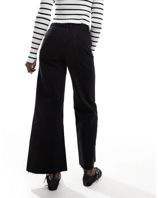 Vaqueros Negros De Pernera Ancha Catherin De Mango de color Black